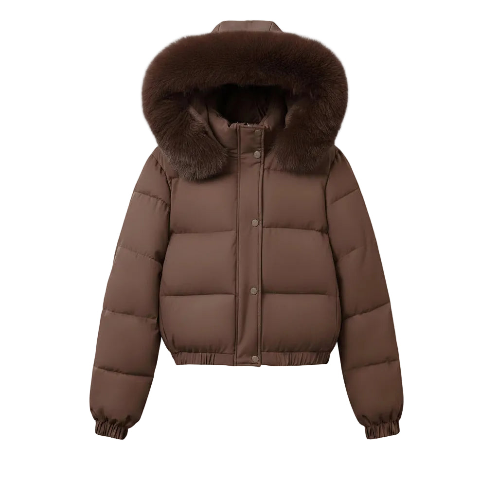 A brown puffer jacket with a large brown faux-fur trimmed hood, hanging on a wooden hanger against a plain light gray wall.
