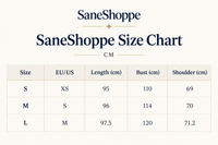 SaneShoppe size chart table in centimeters showing size S, M, and L with EU/US mappings, length, bust, and shoulder measurements on a light beige background.