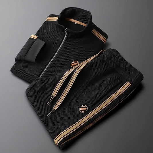 Black jacket with gold accents on a gray background
