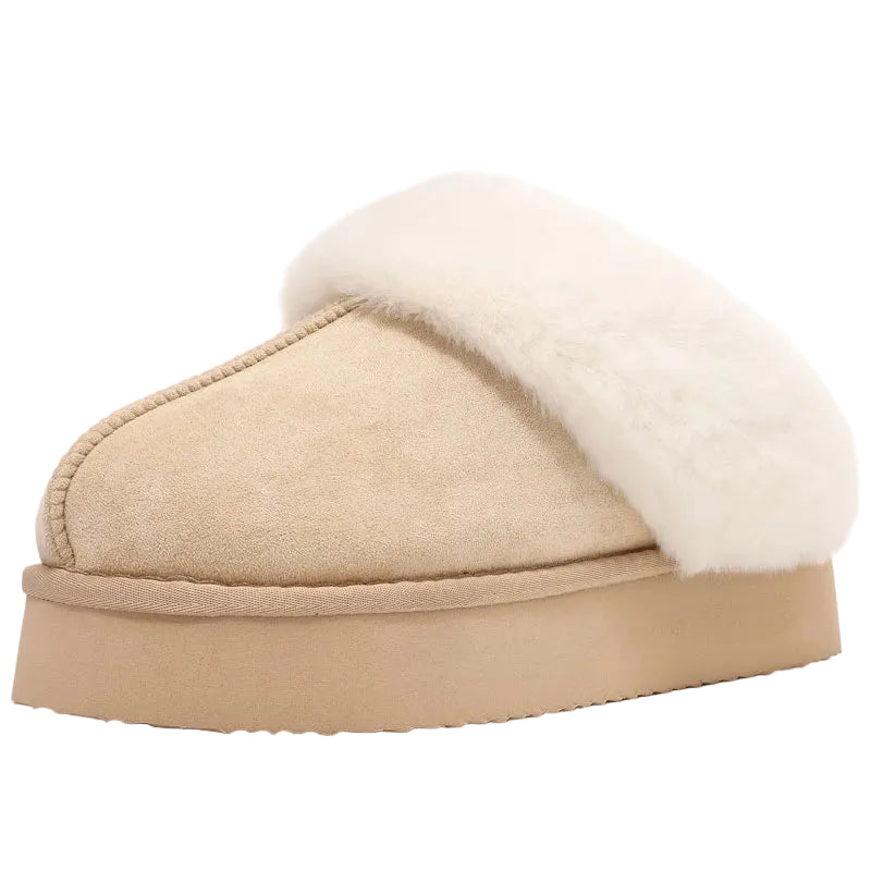 Beige slipper with white fur lining on a white background