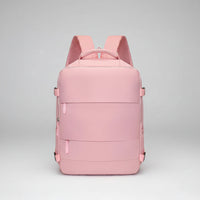 Pink backpack on a white background