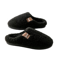 Pair of black slippers with a brand logo on a light gray background