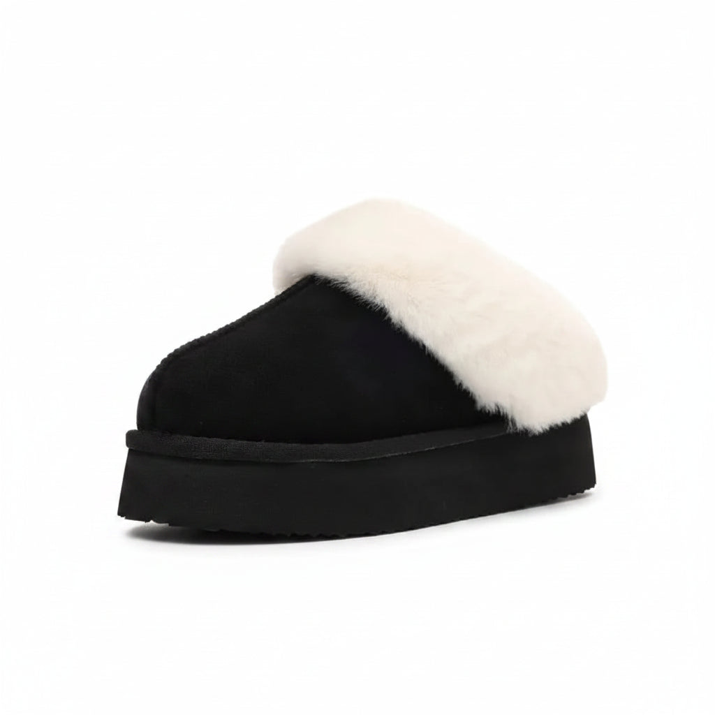 Black slipper with white fur lining on a white background