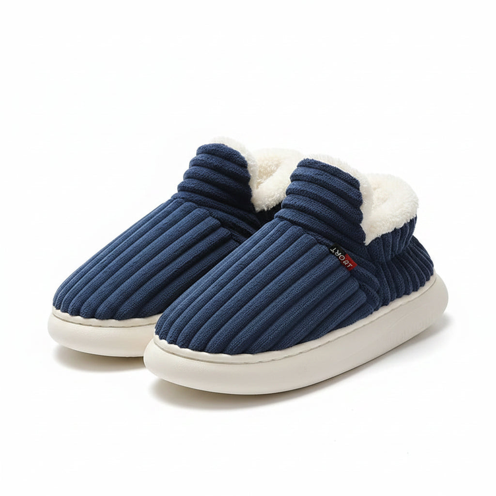 Blue slippers with white fur lining on a light-colored surface