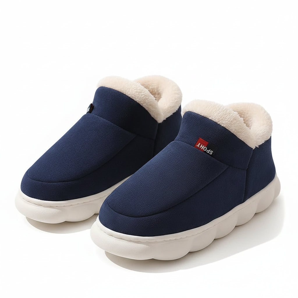 Pair of blue slip-on shoes with white soles on a beige background