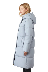 A woman modeling a long, light blue-gray hooded puffer coat shown from a side profile against a plain white background.