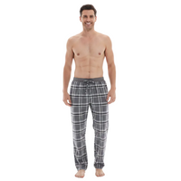 A man modeling gray plaid pajama pants with a white drawstring and snap-button waistband, shown against a plain white background.