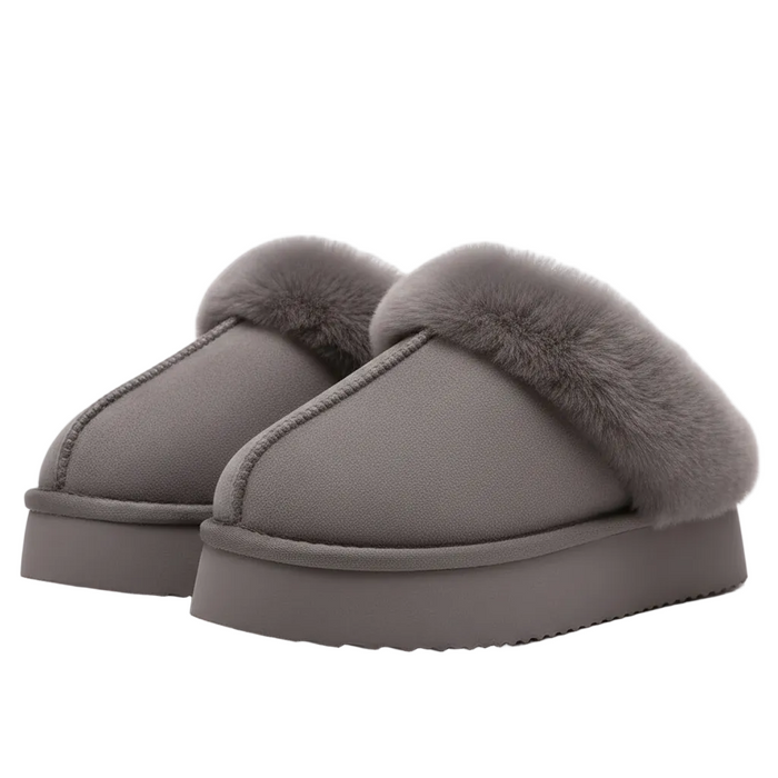 A pair of women's slip-on clogs in taupe gray faux leather with plush gray faux fur trim and thick platform soles, shown on a white background.