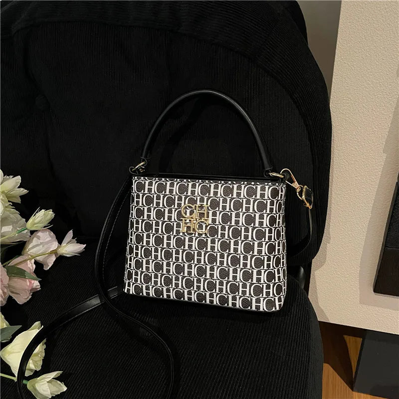 SaneShoppe - Women's Bucket Bag - Spacious Multi - Way Wear (Handheld/Shoulder/Crossbody), Trendy Lettered Design with Inner Compartment