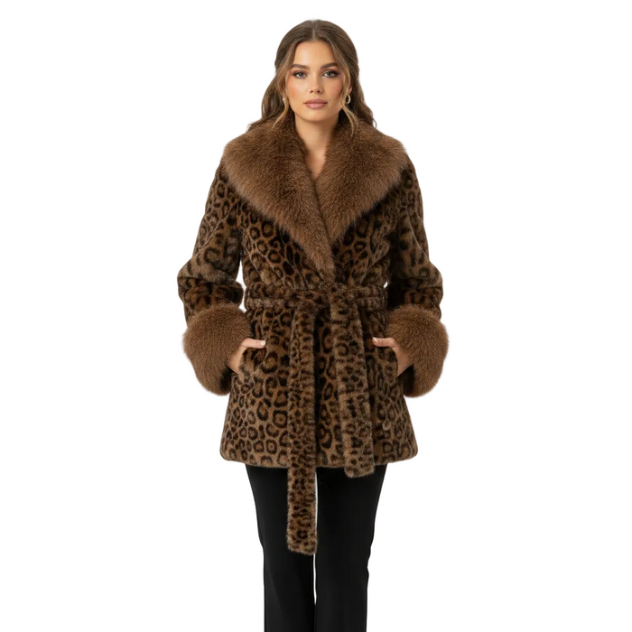 A woman modeling a brown leopard-print faux fur coat with a large brown fur collar, belt, and cuffs, paired with black pants, against a plain white studio background.