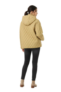 A woman shown from the back wearing a quilted hooded jacket in a warm tan color, paired with black skinny pants and beige ankle boots, against a plain white studio background.